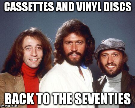 CASSETTES AND VINYL DISCS BACK TO THE SEVENTIES | image tagged in back to the seventies bee gees | made w/ Imgflip meme maker