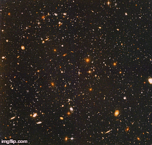  "The Hubble Ultra Deep Field" or a piece of paper covered with assorted jelly beans. | image tagged in gifs,space,trickery | made w/ Imgflip images-to-gif maker