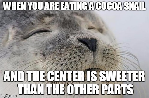 Satisfied Seal | WHEN YOU ARE EATING A COCOA SNAIL AND THE CENTER IS SWEETER THAN THE OTHER PARTS | image tagged in memes,satisfied seal | made w/ Imgflip meme maker