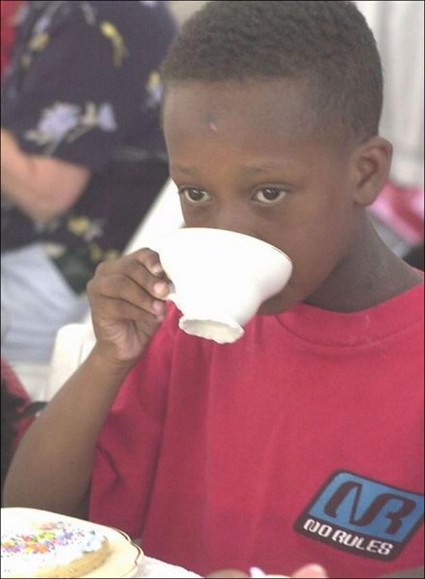 Mad Black kid sips tea Blank Meme Template