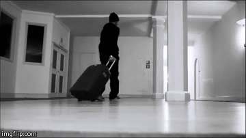Turning around with cases | image tagged in gifs,turning around,cases,funny,fun | made w/ Imgflip video-to-gif maker