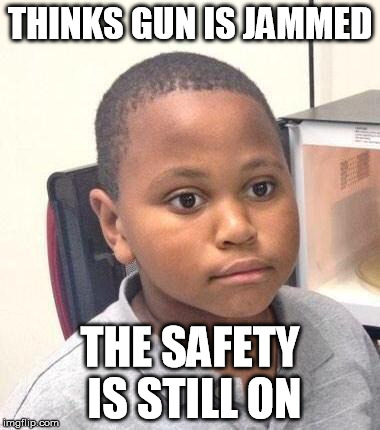 Minor Mistake Marvin | THINKS GUN IS JAMMED THE SAFETY IS STILL ON | image tagged in memes,minor mistake marvin | made w/ Imgflip meme maker