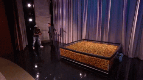 Marshawn Lynch dives into end zone of Skittles | image tagged in gifs | made w/ Imgflip video-to-gif maker