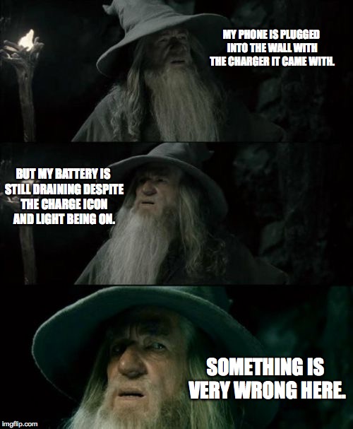 My Phone Is...Charging?  | MY PHONE IS PLUGGED INTO THE WALL WITH THE CHARGER IT CAME WITH. BUT MY BATTERY IS STILL DRAINING DESPITE THE CHARGE ICON AND LIGHT BEING ON | image tagged in memes,confused gandalf,phone,iphone,galaxy,samsung | made w/ Imgflip meme maker