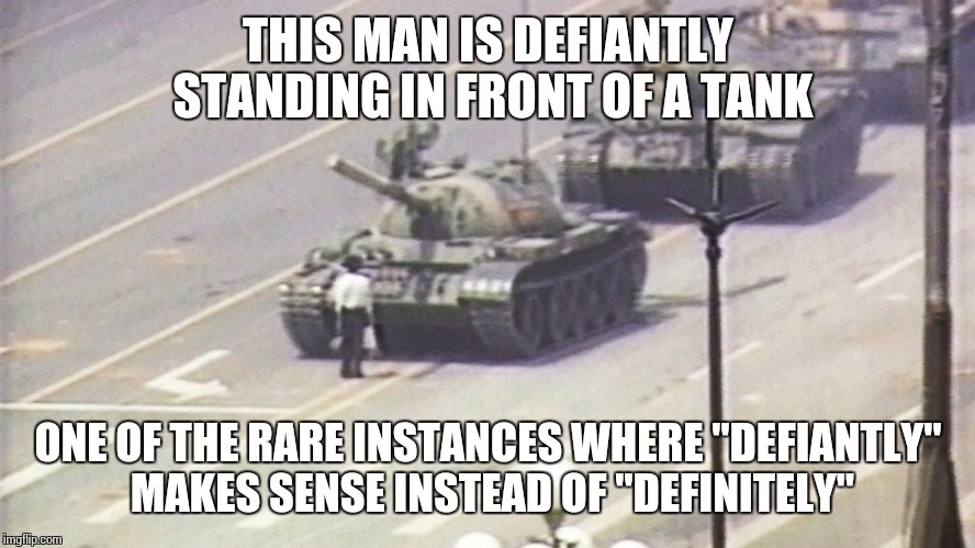 Most people use them interchangeably. | THIS MAN IS DEFIANTLY STANDING IN FRONT OF A TANK ONE OF THE RARE INSTANCES WHERE "DEFIANTLY" MAKES SENSE INSTEAD OF "DEFINITELY" | image tagged in education | made w/ Imgflip meme maker