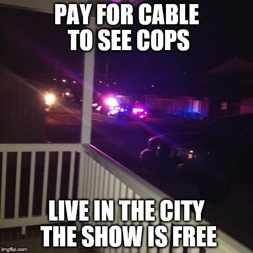 City lights | PAY FOR CABLE TO SEE COPS LIVE IN THE CITY THE SHOW IS FREE | image tagged in wrong neighborhood | made w/ Imgflip meme maker