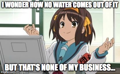 Haruhi Computer | I WONDER HOW NO WATER COMES OUT OF IT BUT THAT'S NONE OF MY BUSINESS... | image tagged in haruhi computer | made w/ Imgflip meme maker