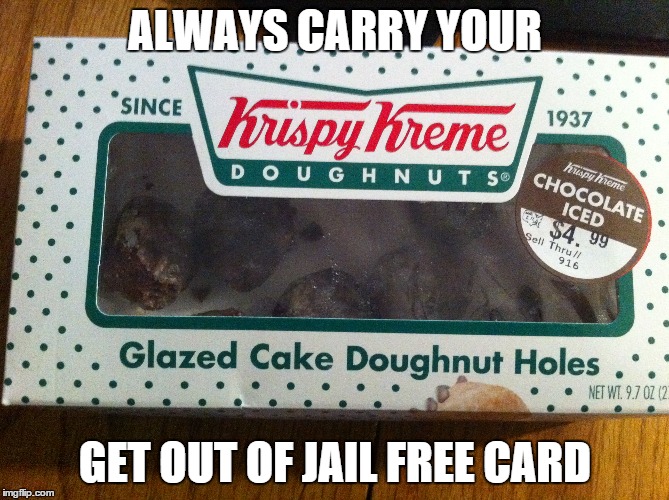 eat em and smile! | ALWAYS CARRY YOUR GET OUT OF JAIL FREE CARD | image tagged in cops,cops and donuts | made w/ Imgflip meme maker