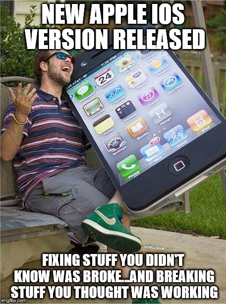 And here comes a new iOS for your phone... | NEW APPLE IOS VERSION RELEASED FIXING STUFF YOU DIDN'T KNOW WAS BROKE...AND BREAKING STUFF YOU THOUGHT WAS WORKING | image tagged in giant iphone | made w/ Imgflip meme maker