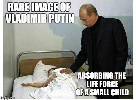 Rare image of Putin.... | RARE IMAGE OF VLADIMIR PUTIN ABSORBING THE LIFE FORCE OF A SMALL CHILD | image tagged in vladimir putin,russia,funny,memes | made w/ Imgflip meme maker