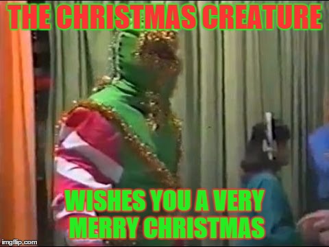 christmas creature  | THE CHRISTMAS CREATURE WISHES YOU A VERY MERRY CHRISTMAS | image tagged in pro wrestling,christmas,holidays | made w/ Imgflip meme maker