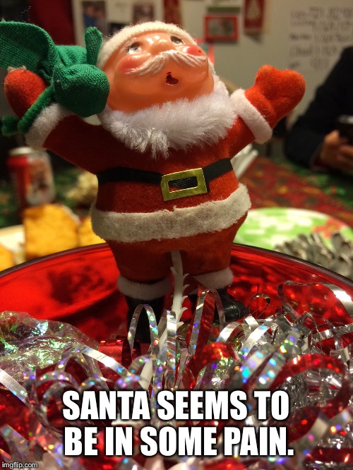Not sure what twisted mind thought this up. | SANTA SEEMS TO BE IN SOME PAIN. | image tagged in santa | made w/ Imgflip meme maker