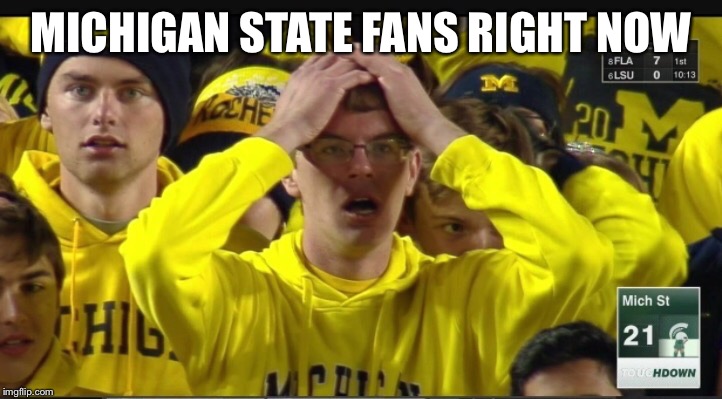 Stunned Michigan fan | MICHIGAN STATE FANS RIGHT NOW | image tagged in stunned michigan fan | made w/ Imgflip meme maker