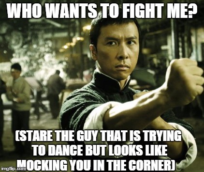 Ip Man | WHO WANTS TO FIGHT ME? (STARE THE GUY THAT IS TRYING TO DANCE BUT LOOKS LIKE MOCKING YOU IN THE CORNER) | image tagged in ip man | made w/ Imgflip meme maker