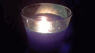 Light in the Dark | image tagged in gifs,candle,light,light in the dark | made w/ Imgflip video-to-gif maker