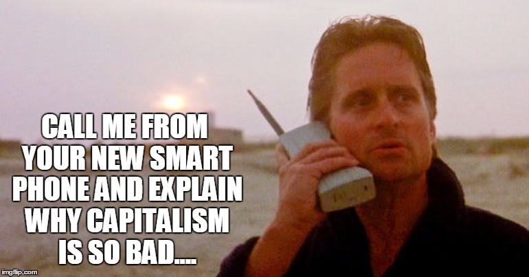 In the 80's, Only The Rich Could Afford Cordless Phones The Size Of Bricks | CALL ME FROM YOUR NEW SMART PHONE AND EXPLAIN WHY CAPITALISM IS SO BAD.... | image tagged in wall street beach phone,capitalism,wall street | made w/ Imgflip meme maker