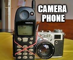 I keep up to date with new tech... | CAMERA PHONE | image tagged in memes,technology,camera phone | made w/ Imgflip meme maker