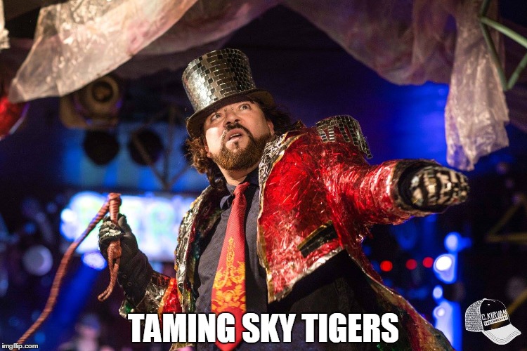 TAMING SKY TIGERS | image tagged in gay,fashion,lion tamer,whip | made w/ Imgflip meme maker