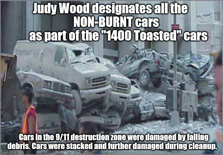 Judy Wood designates all the             NON-BURNT cars              as part of the "1400 Toasted" cars; Cars in the 9/11 destruction zone were damaged by falling debris. Cars were stacked and further damaged during cleanup. | image tagged in 9/11,9/11 truth movement,ae911t,twin towers,world trade center | made w/ Imgflip meme maker